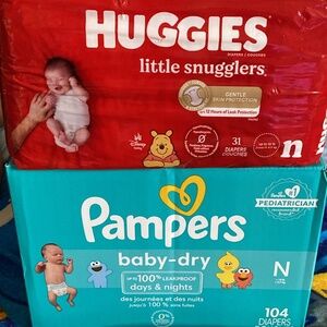 Newborn case pampers an case of wipes